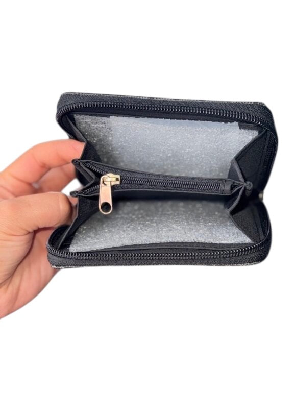Cartera Tommy H.